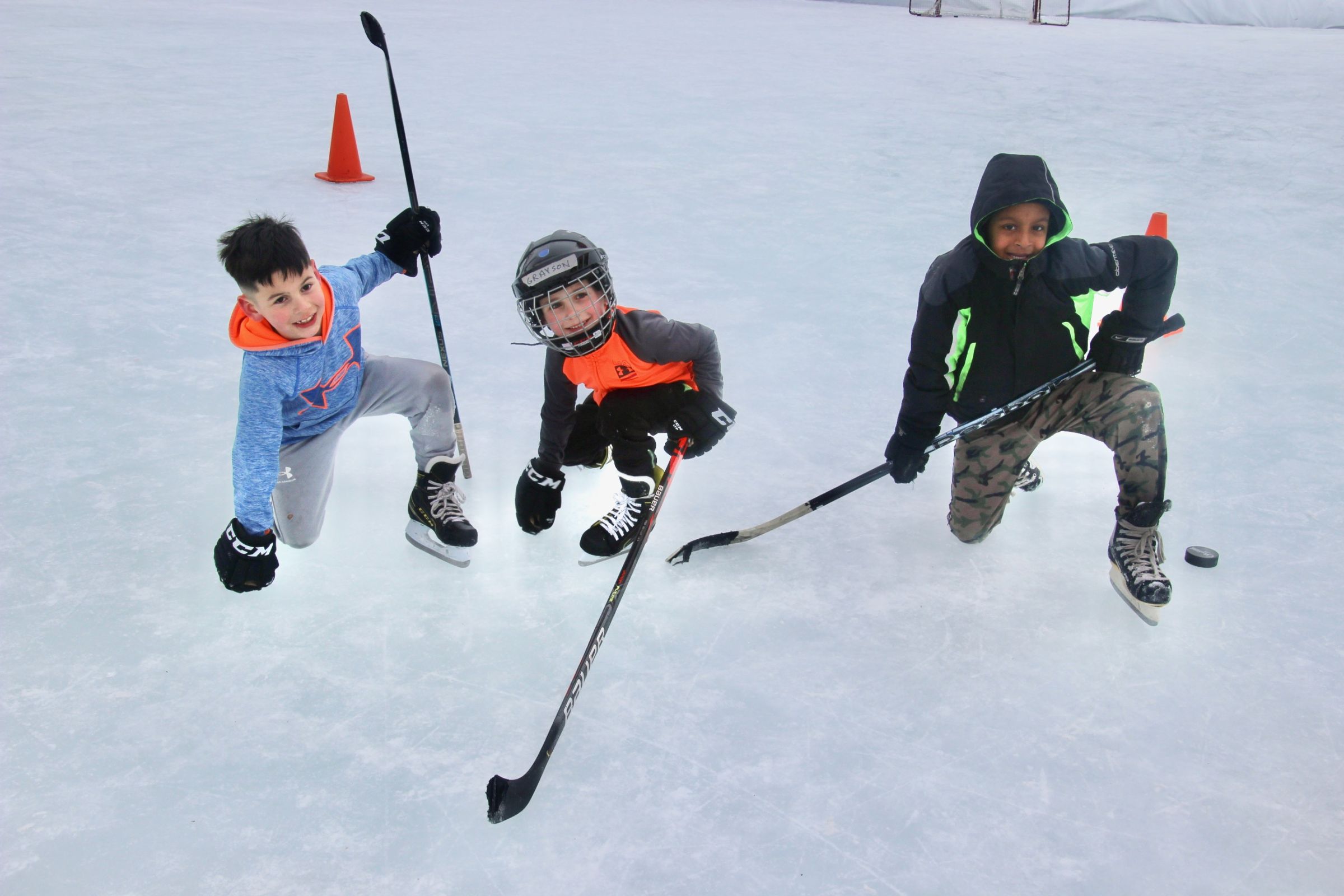 Young Kids Playing Hockey